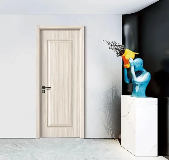 Modern white wooden interior door installed in a bright residential room