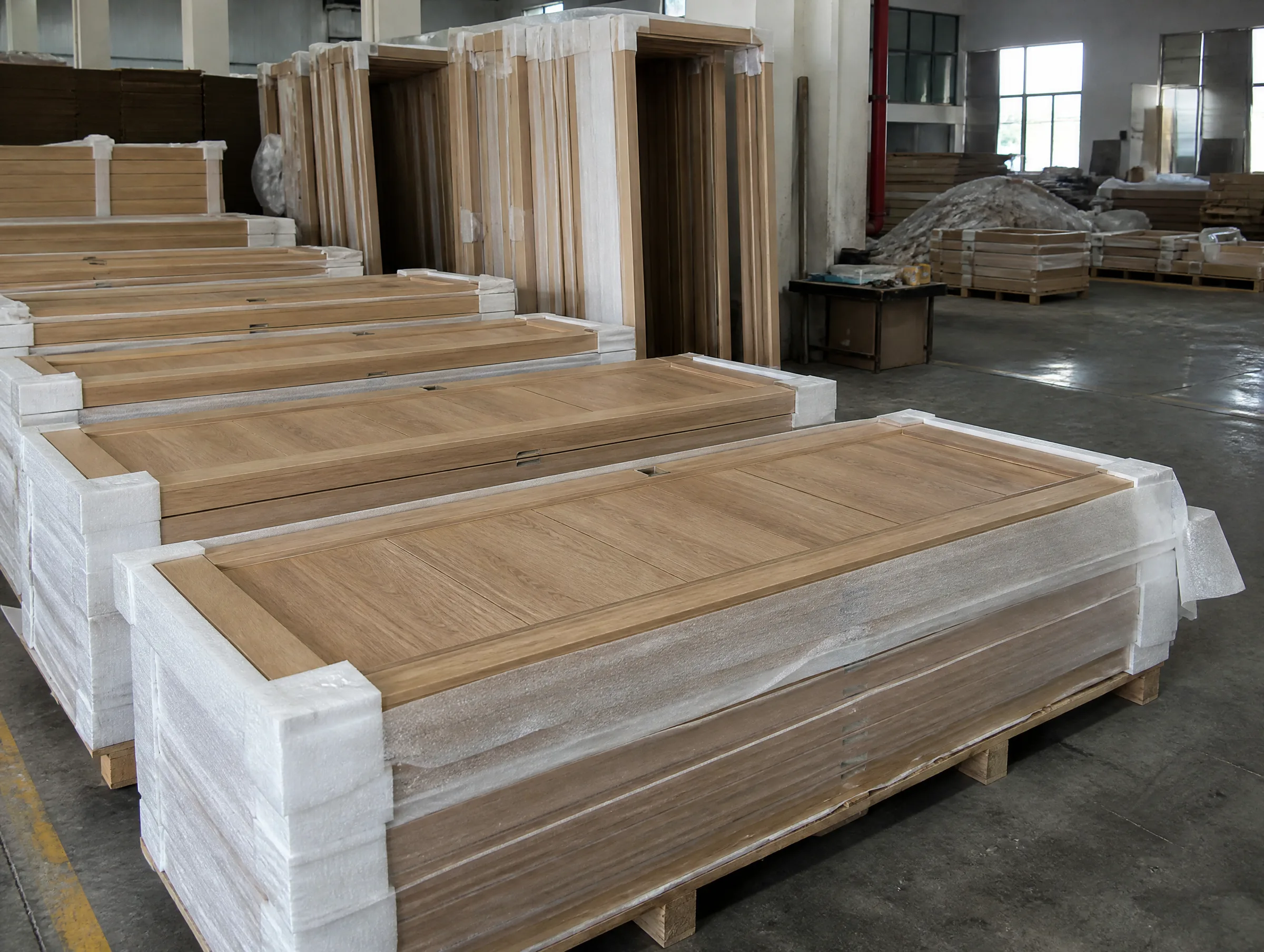 Export-packed brown wooden interior doors prepared for project shipment